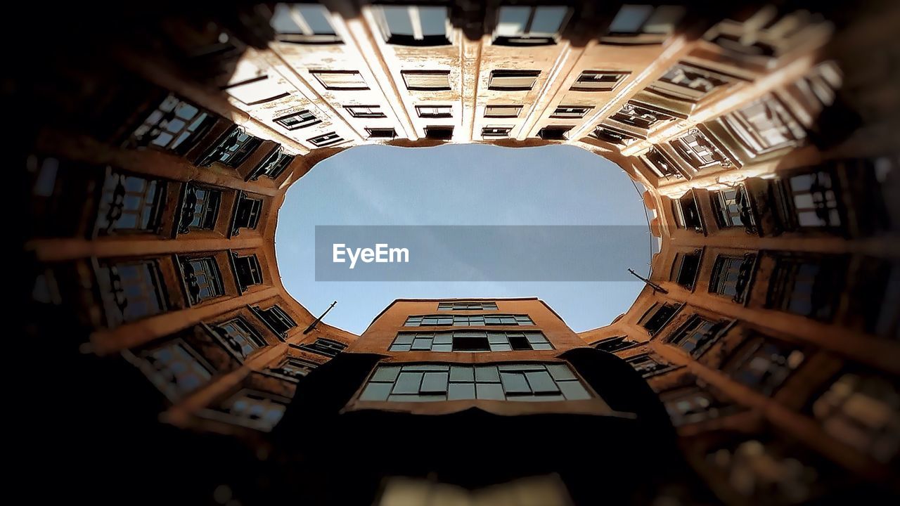 Directly below shot of casa mila against sky