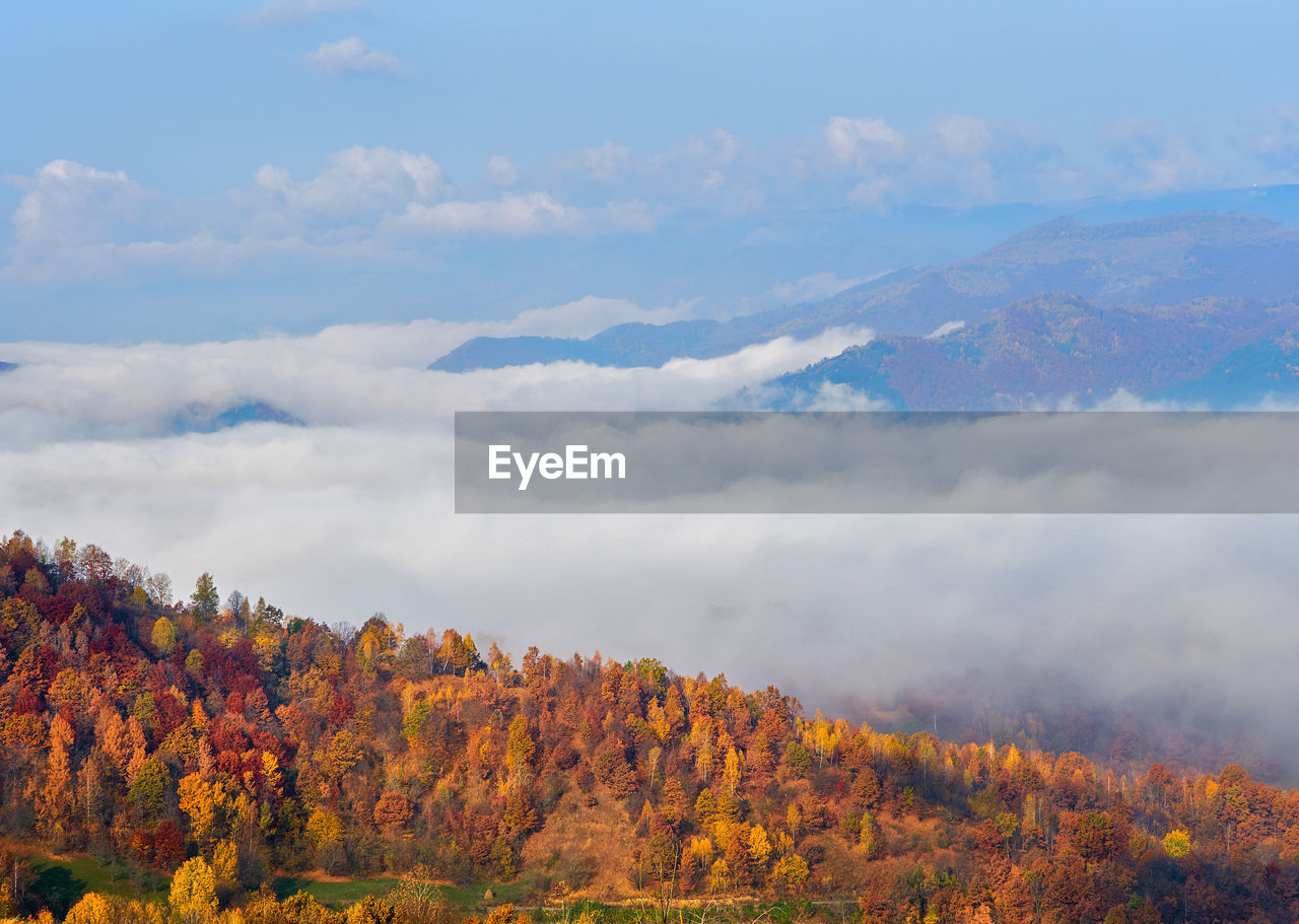 Scenic view of mountains against sky during autumn