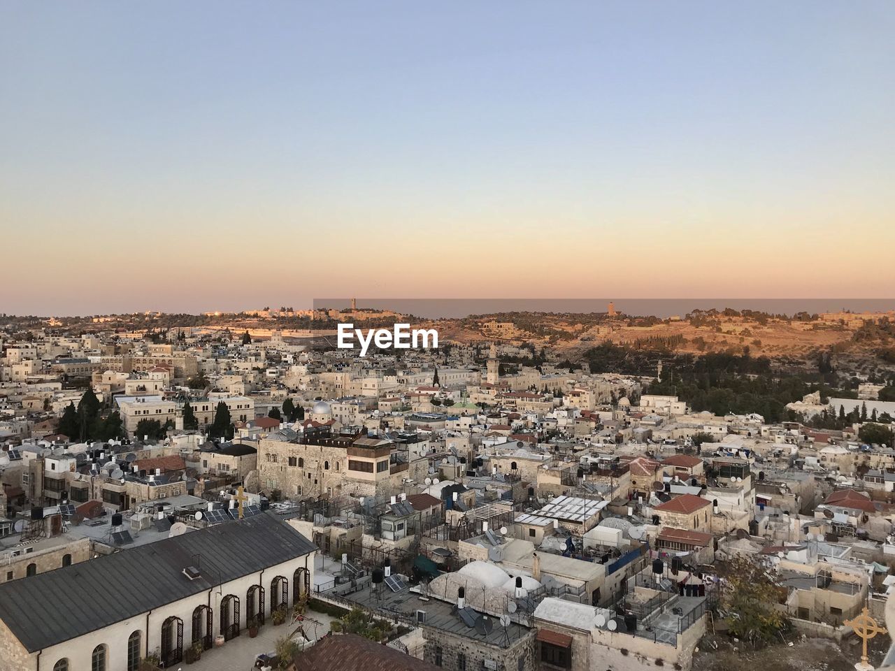 High angle view of townscape against sky during sunset