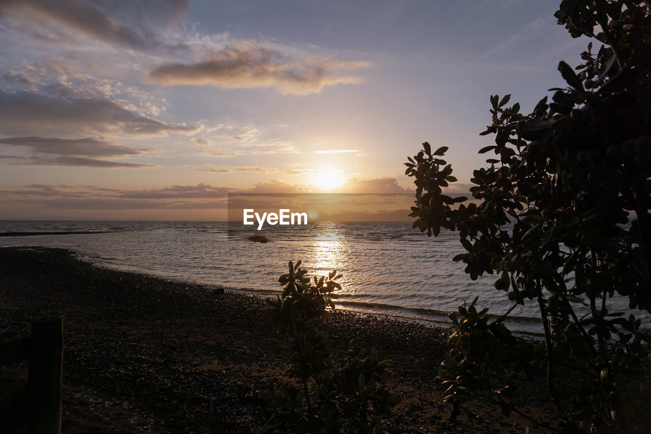 Scenic view of sea against sky during sunset