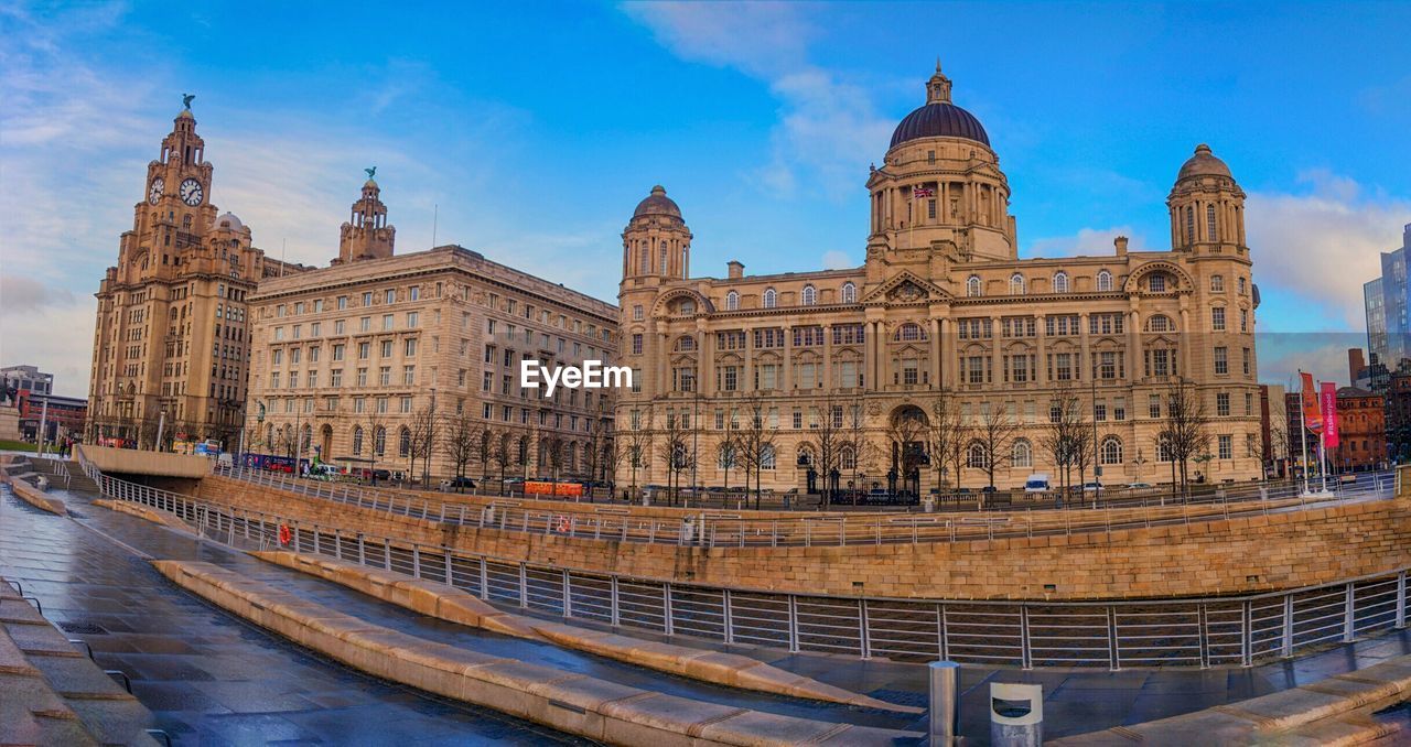 BUILDINGS AGAINST BLUE SKY