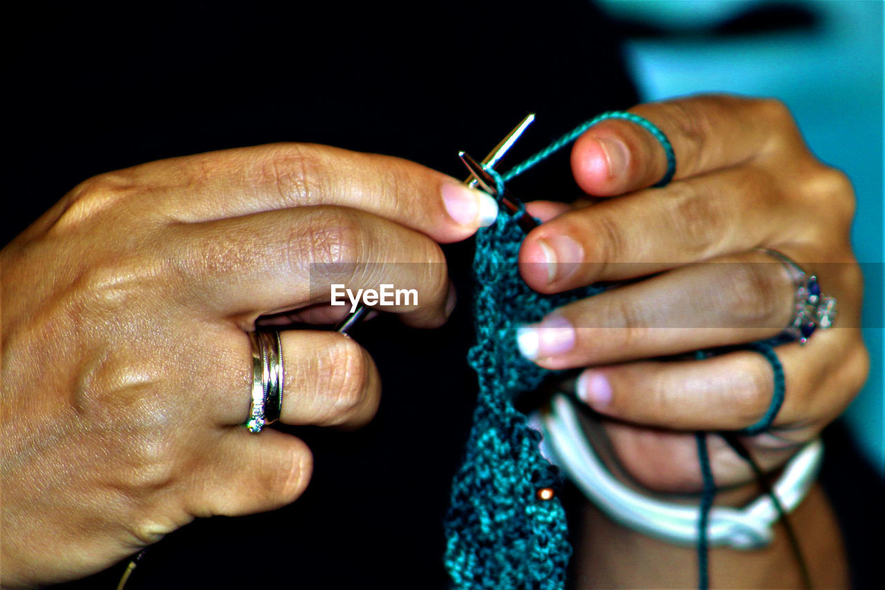 Woman knitting close up of hands