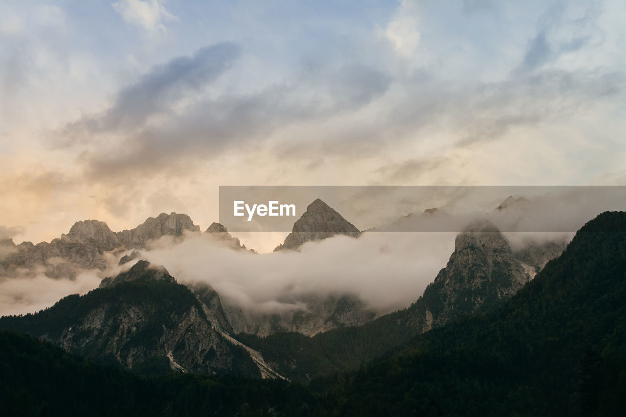 Scenic view of mountains against sky during sunset