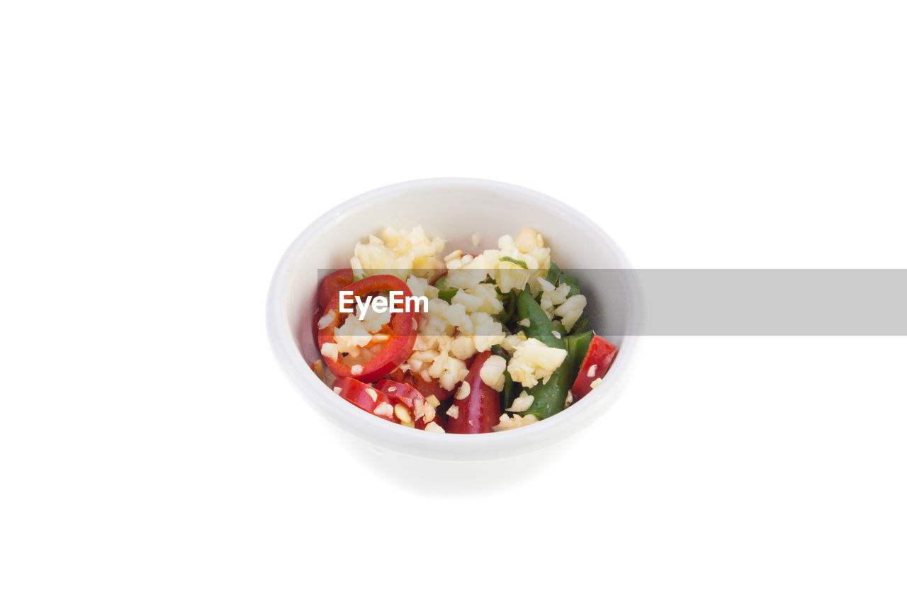 Close-up of salad in bowl against white background