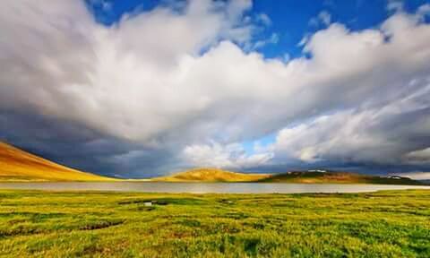 SCENIC VIEW OF LANDSCAPE AGAINST CLOUDY SKY