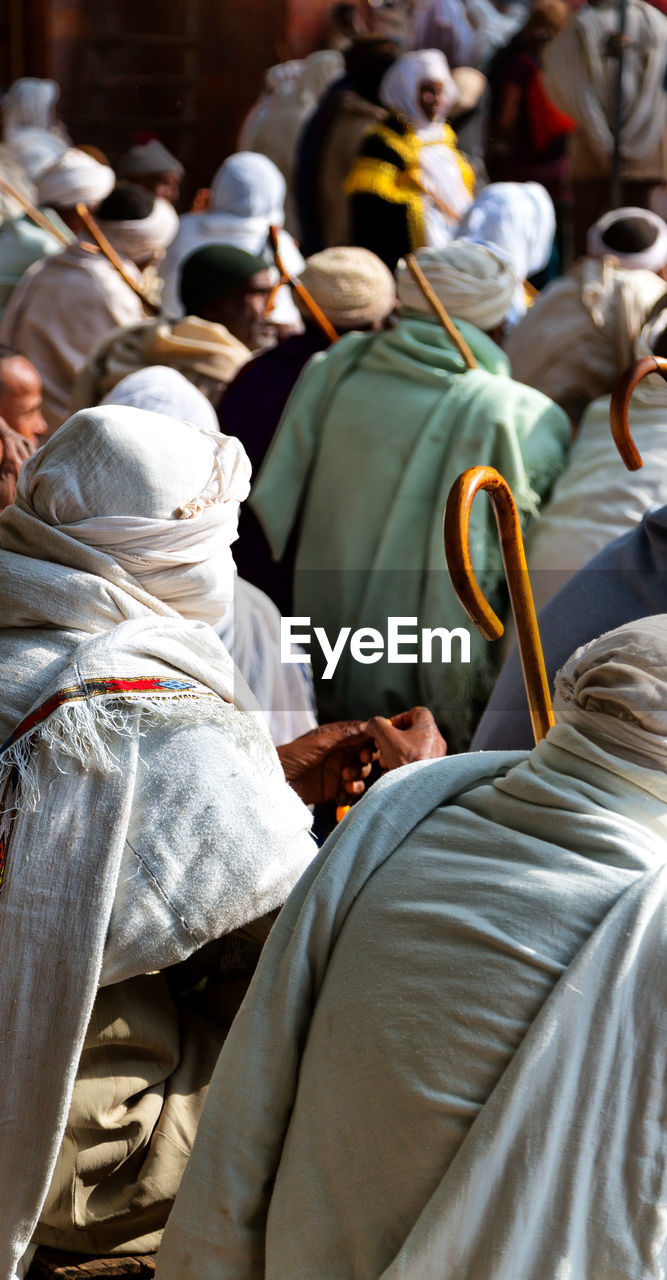 Men wearing traditional clothing outdoors