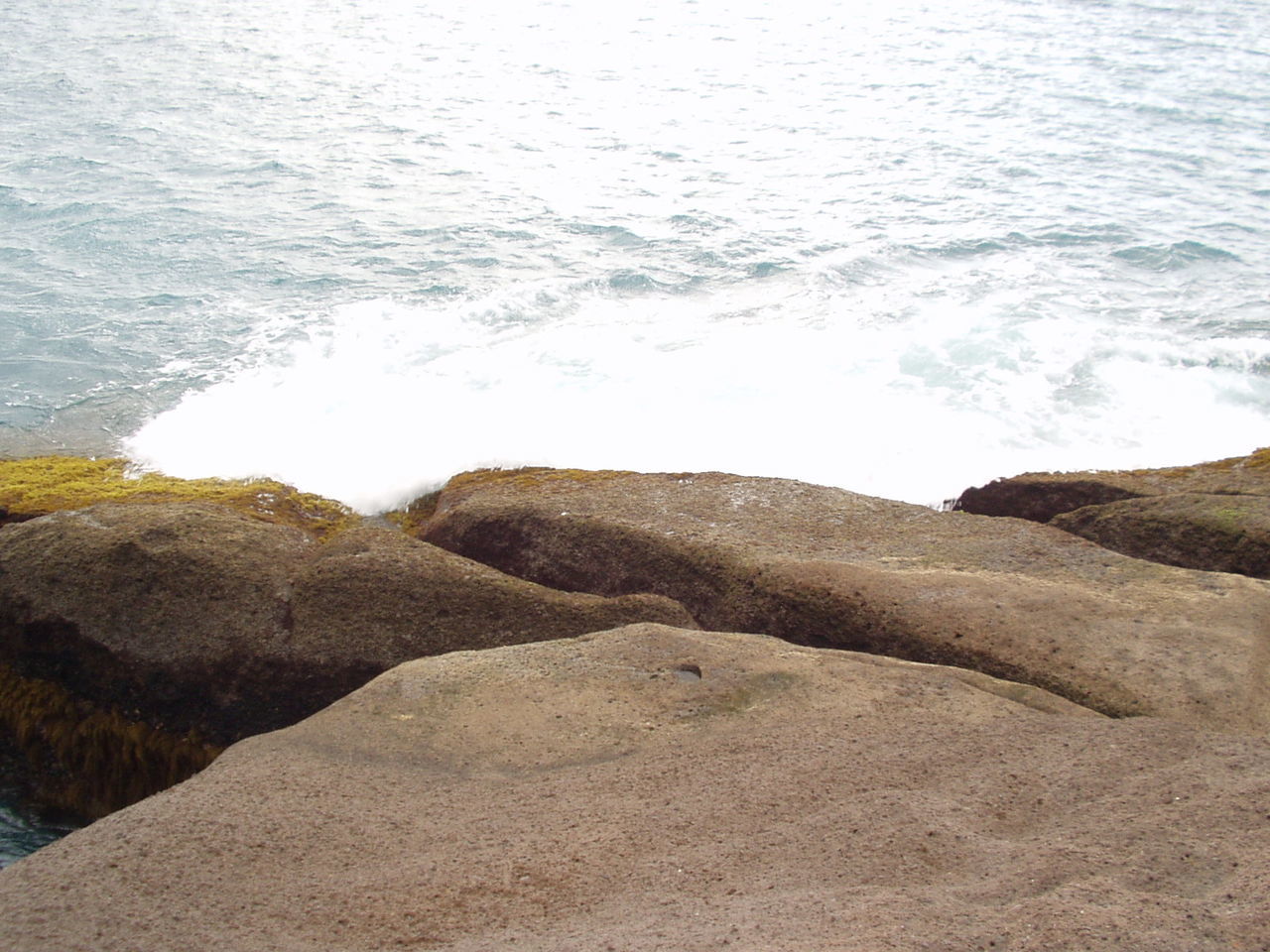 High angle view of sea seen from cliff