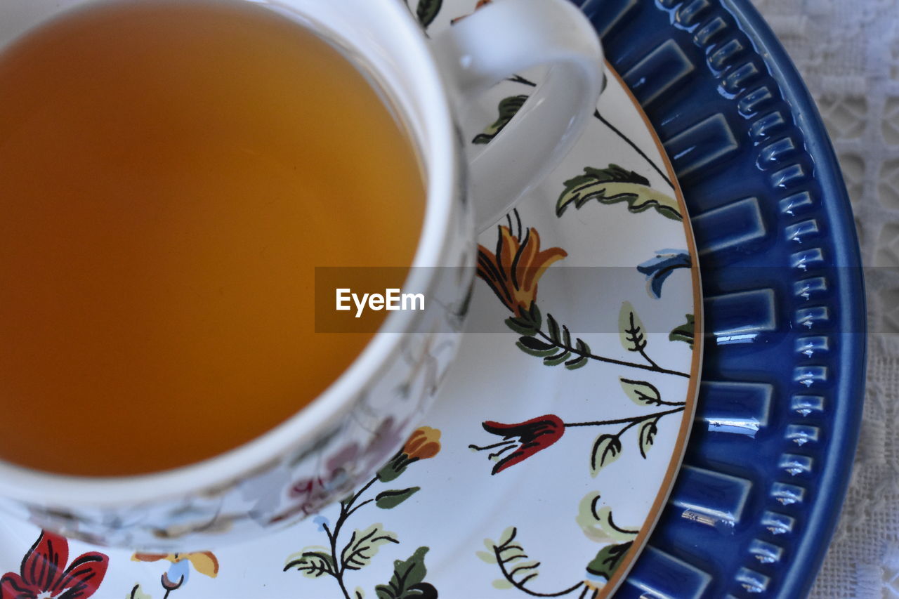 CLOSE-UP OF CUP OF TEA ON TABLE