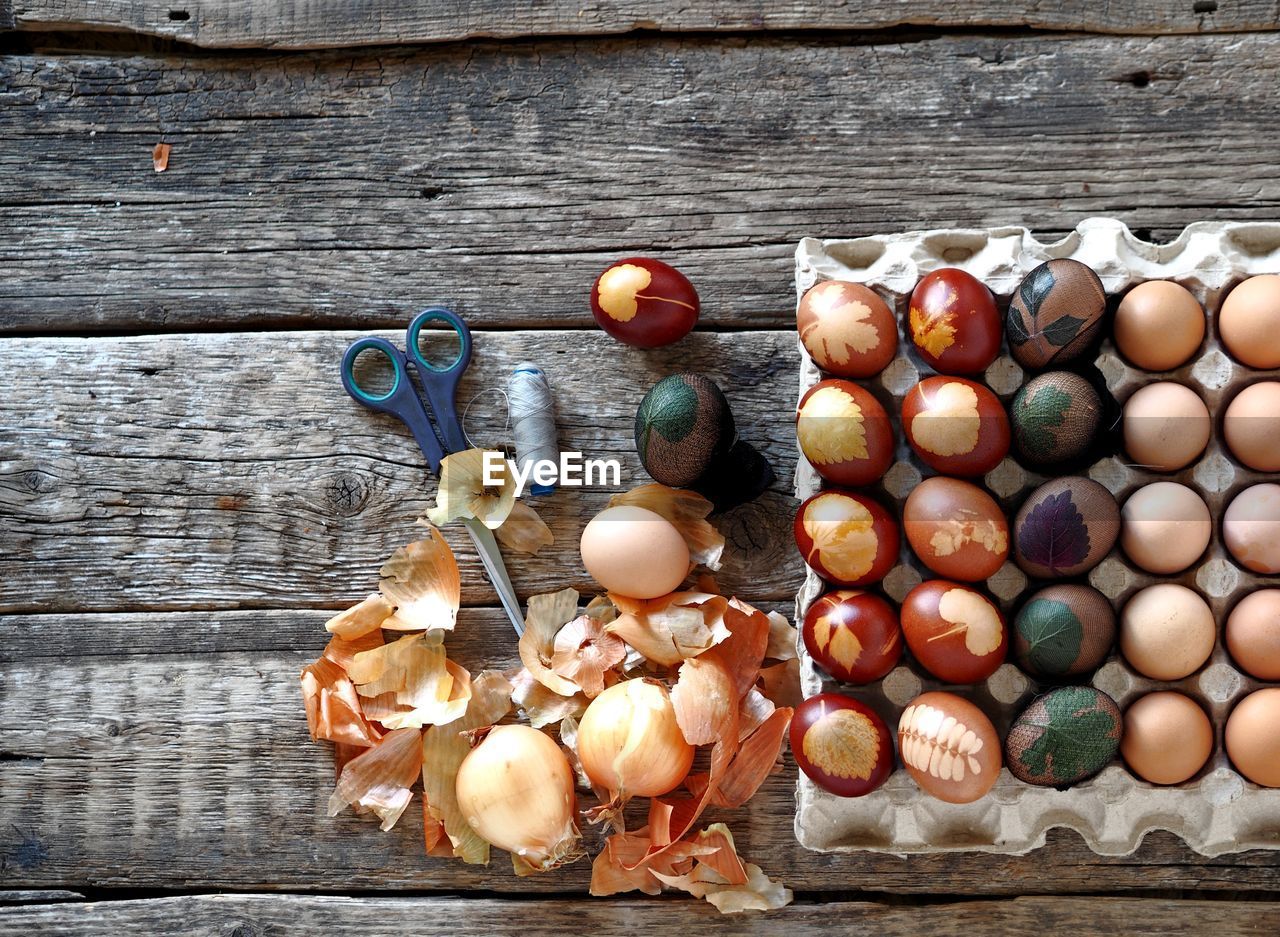 The concept of preparing for the easter holiday. painted eggs on a wooden background.