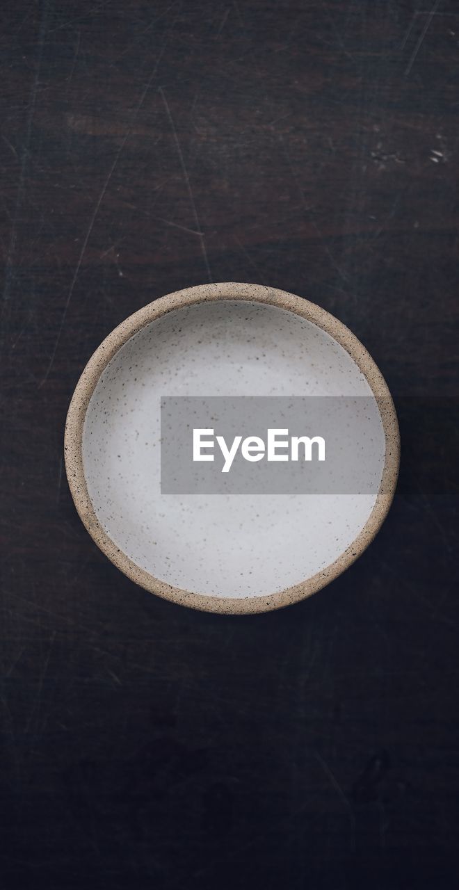 HIGH ANGLE VIEW OF COFFEE CUP
