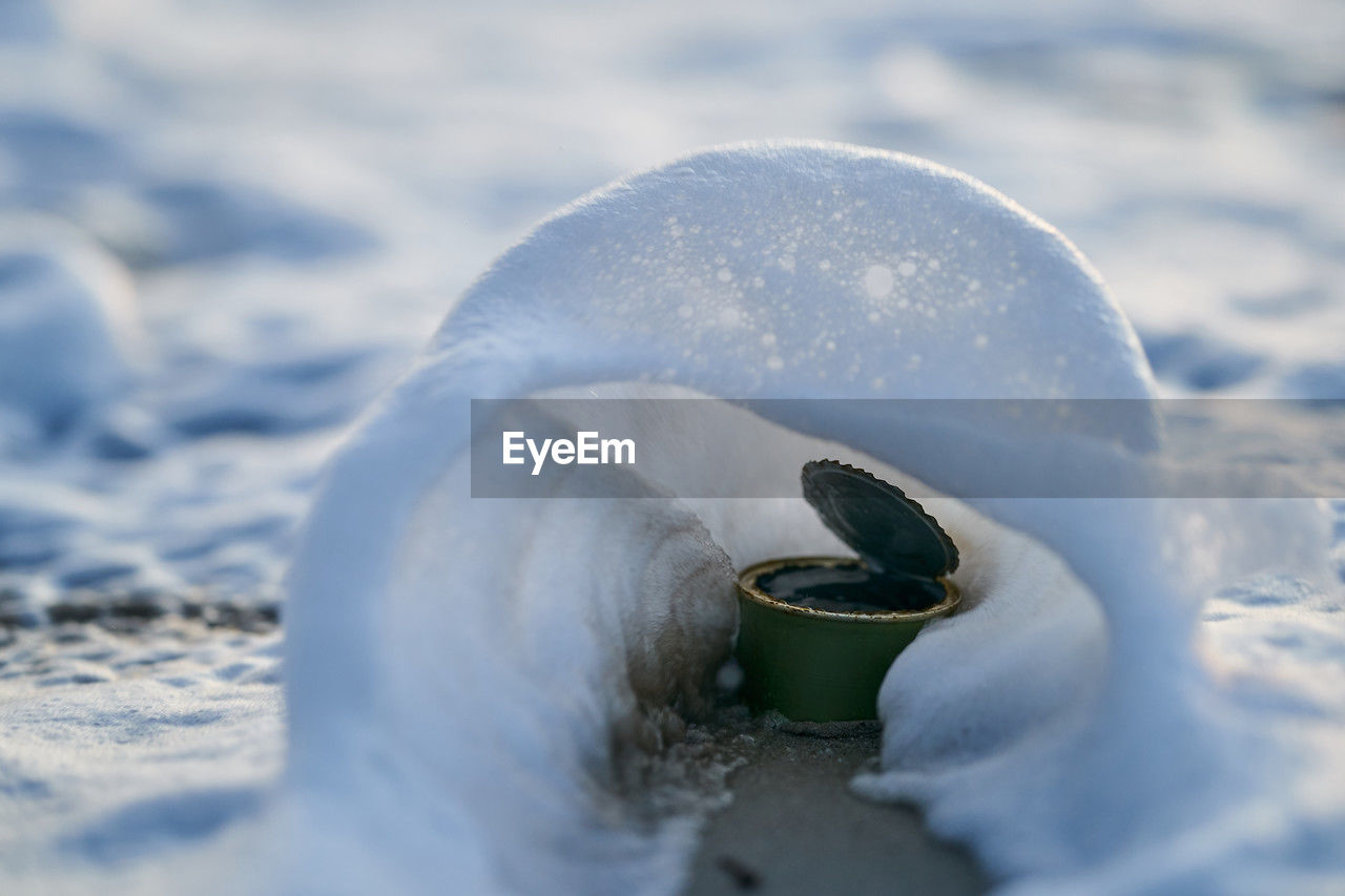 close-up of wedding dress on snow