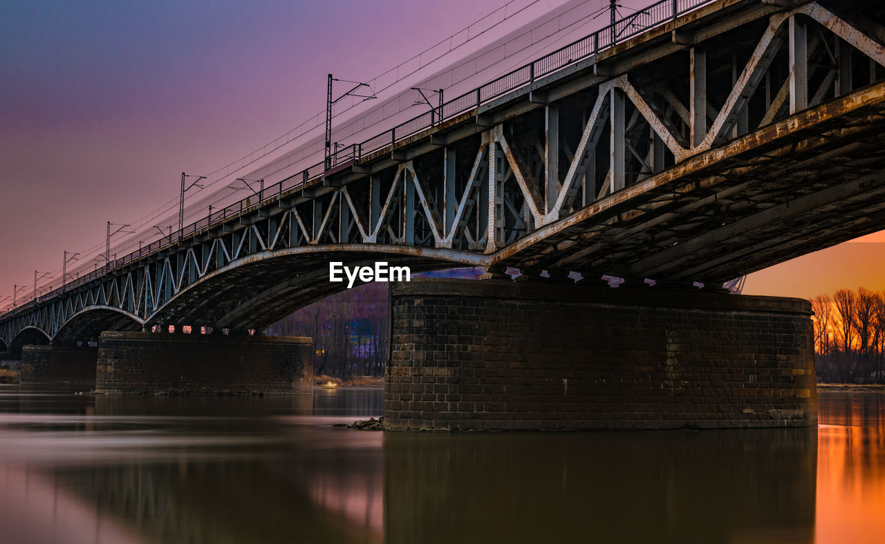 Low angle view of bridge over river