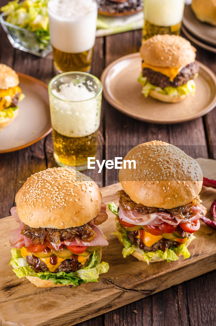 Close-up of burger on serving board at table