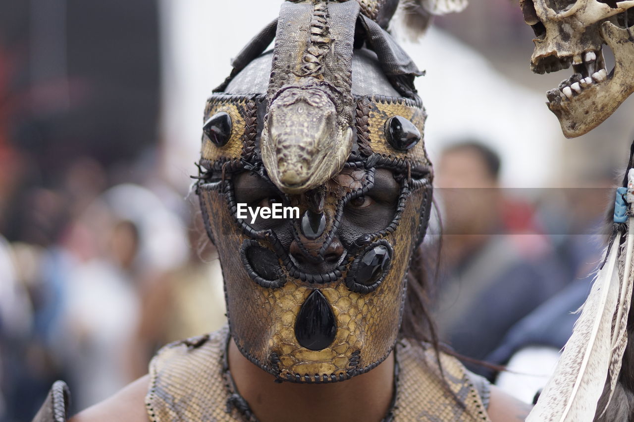 Close-up portrait of mature man wearing mask