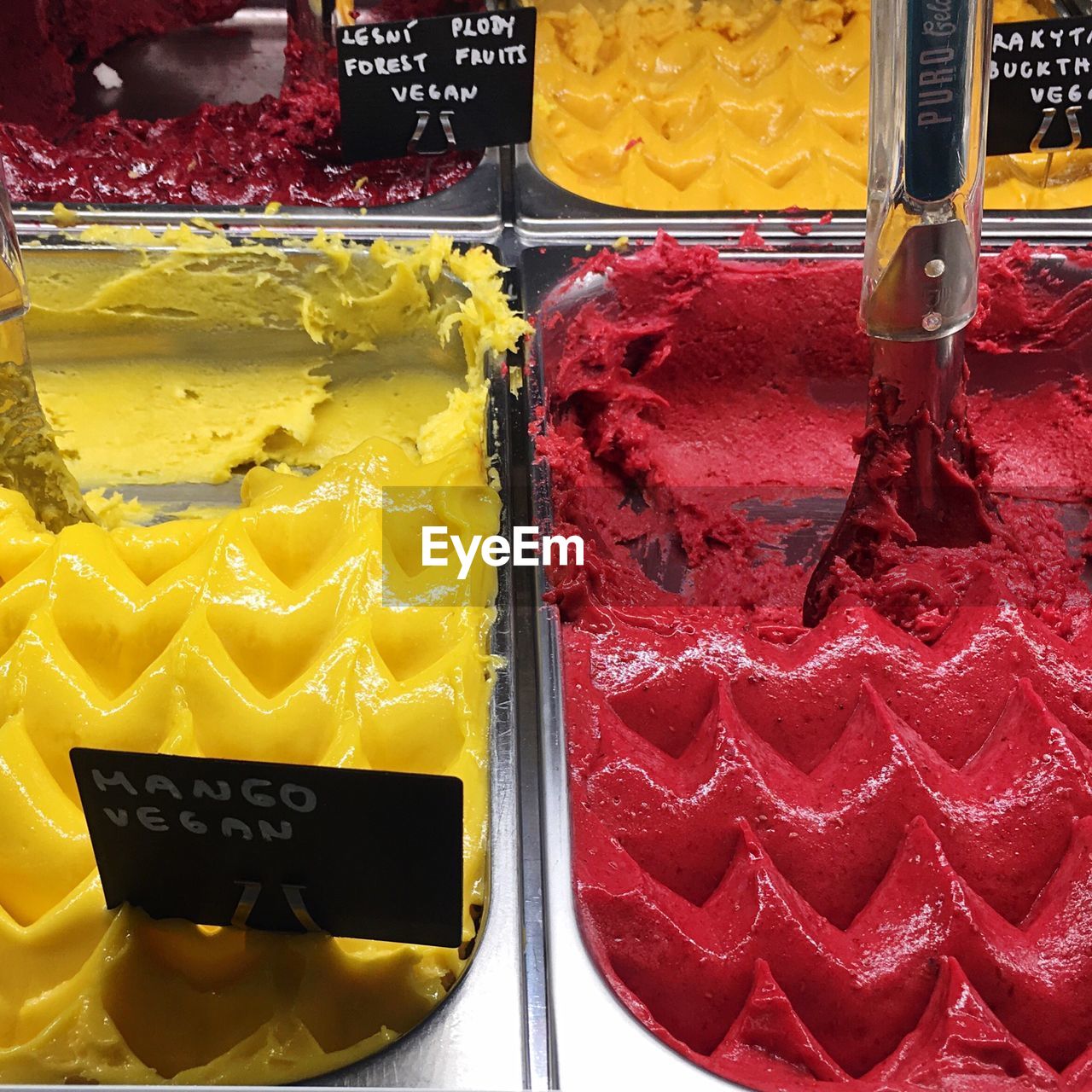 CLOSE-UP OF ICE CREAM FOR SALE AT SHOP