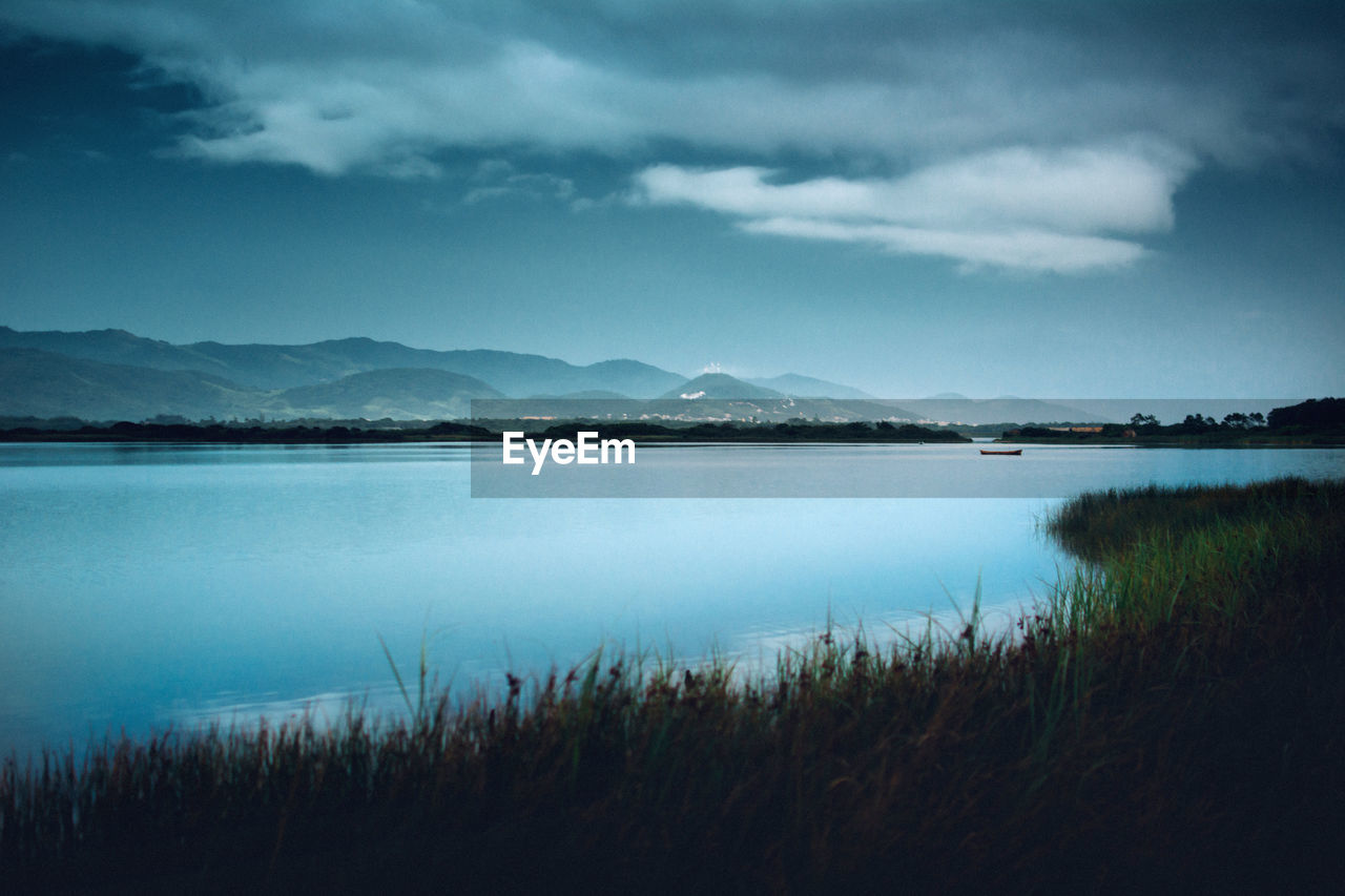 Scenic view of lake against sky