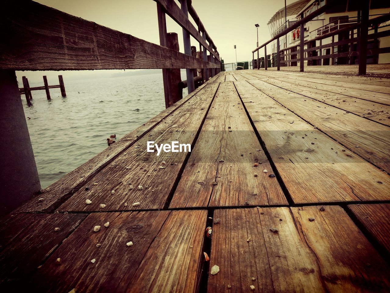 SURFACE LEVEL VIEW OF WOODEN PIER