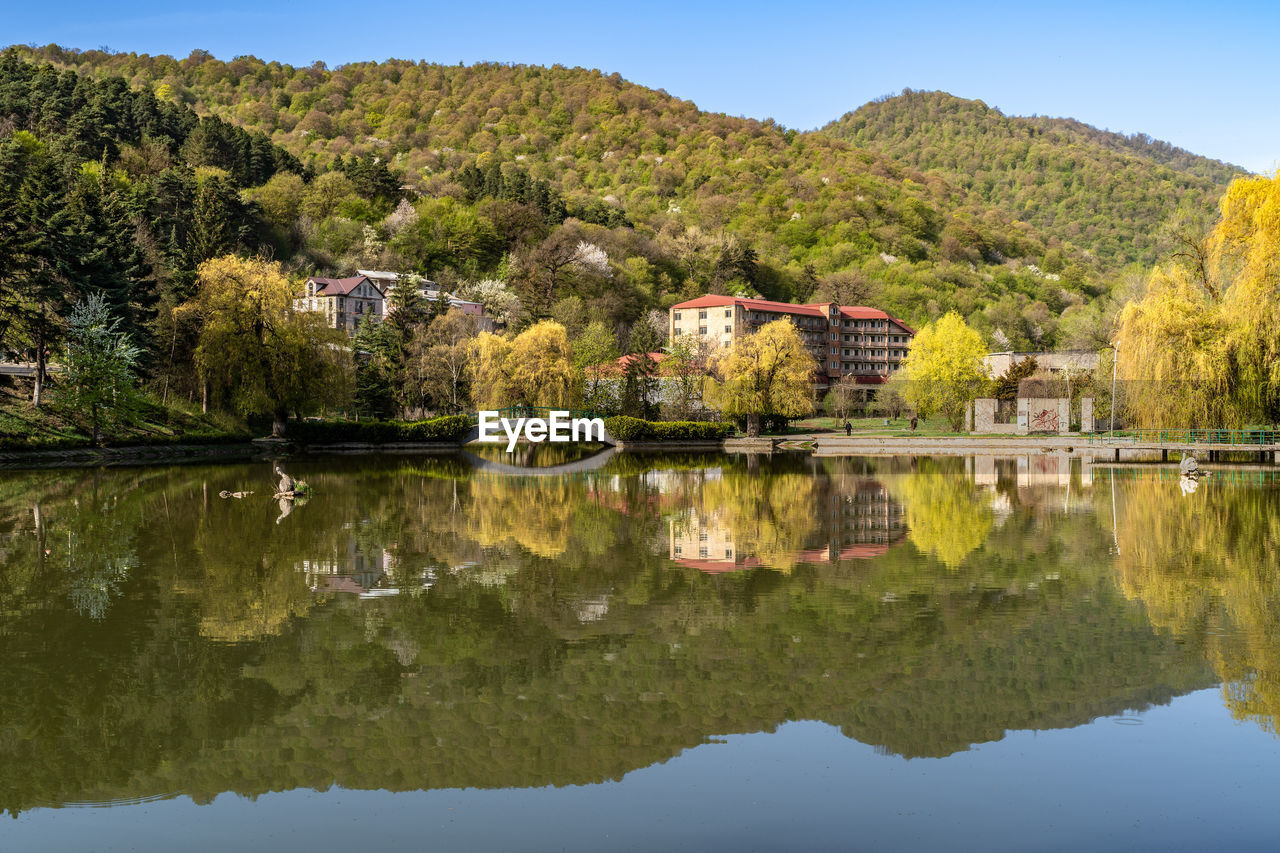 Dilijan, armenia - april 27, 2022 - beautiful view of small lake at dilijan city park on sunny day