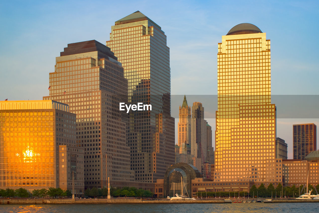 Skyscrapers in city against sky