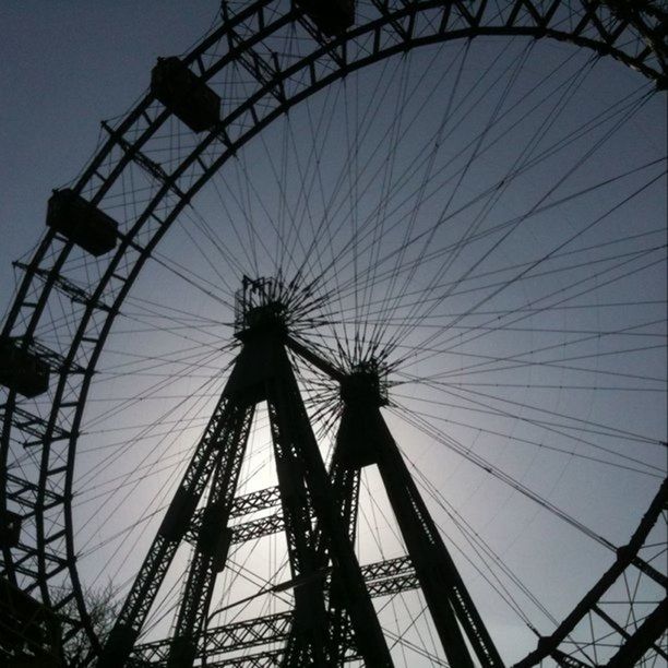 LOW ANGLE VIEW OF FERRIS WHEEL AGAINST SKY