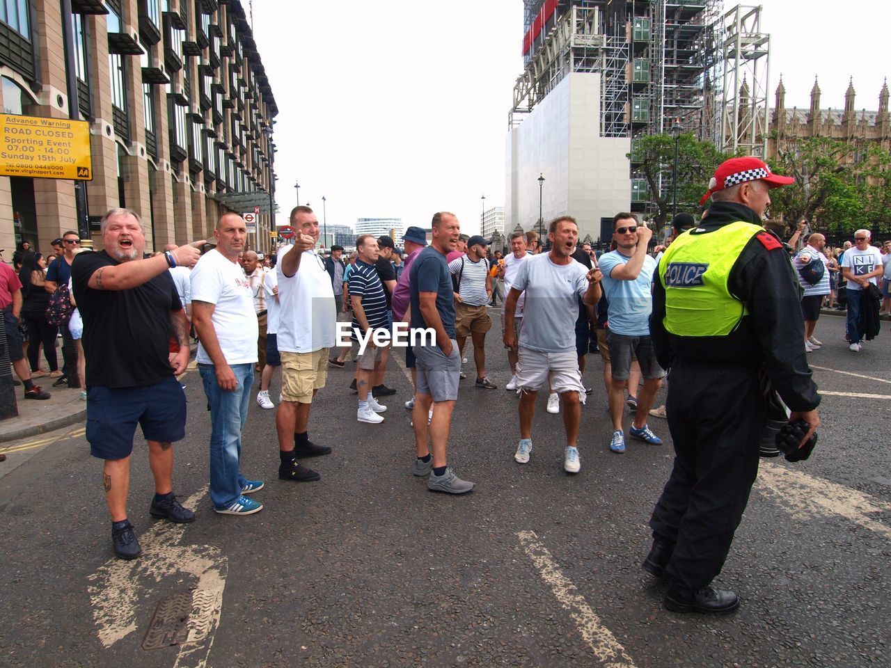 PEOPLE ON STREET IN CITY