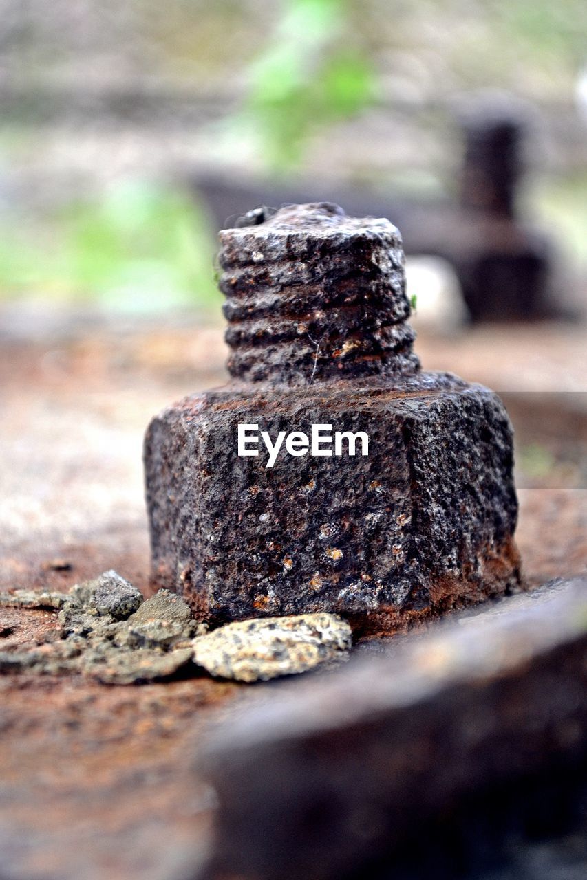 CLOSE-UP VIEW OF RUSTY METAL STRUCTURE