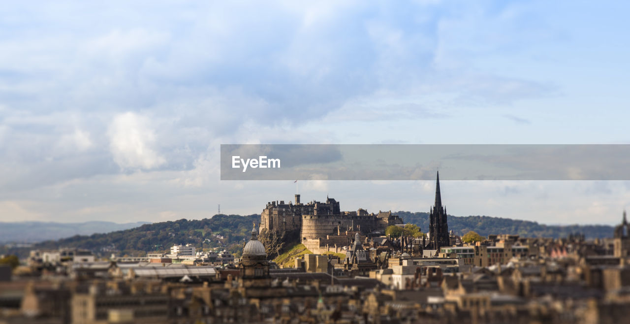 Edinburgh castle and town against sky