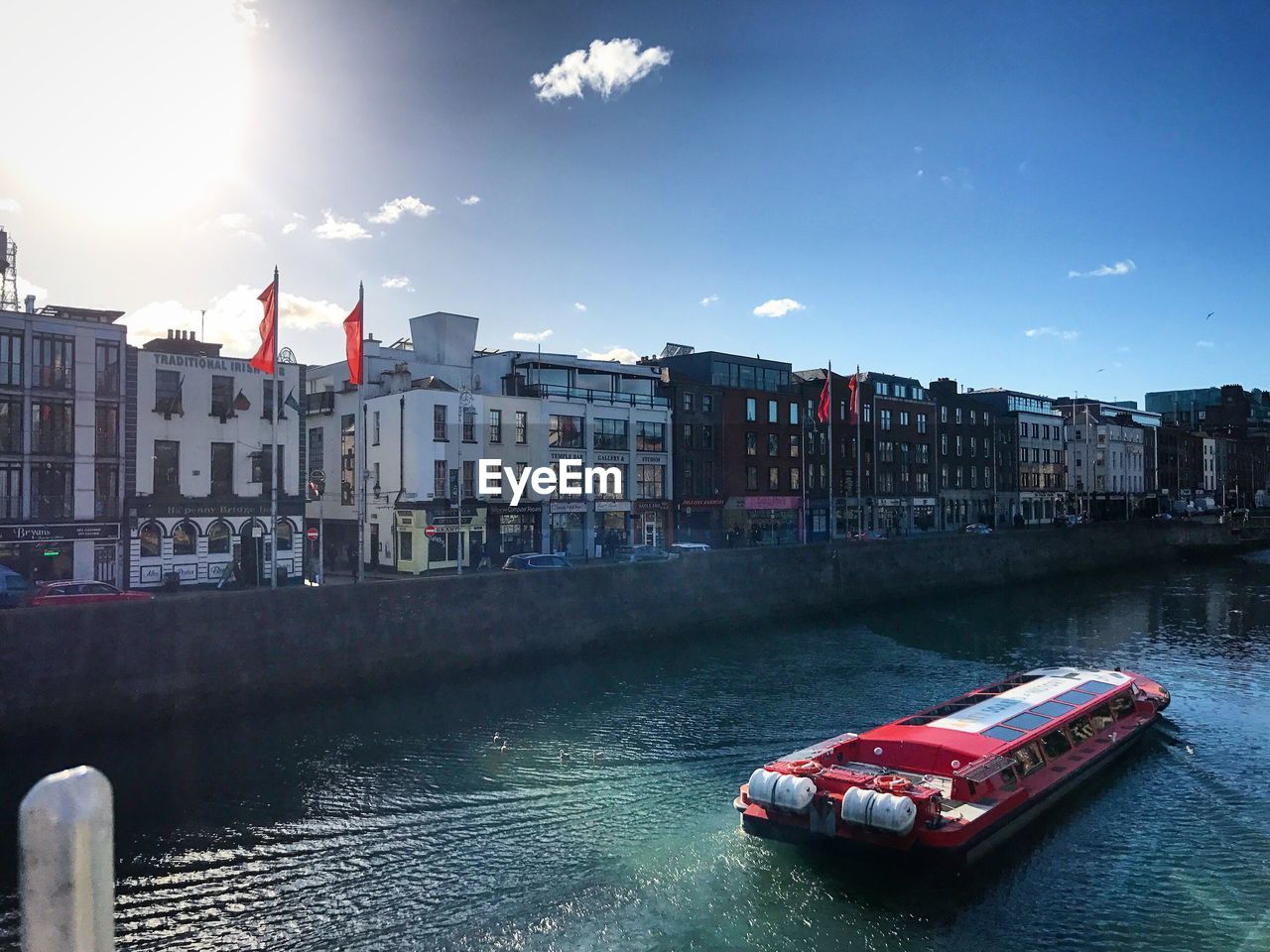 FERRY BOAT IN CITY