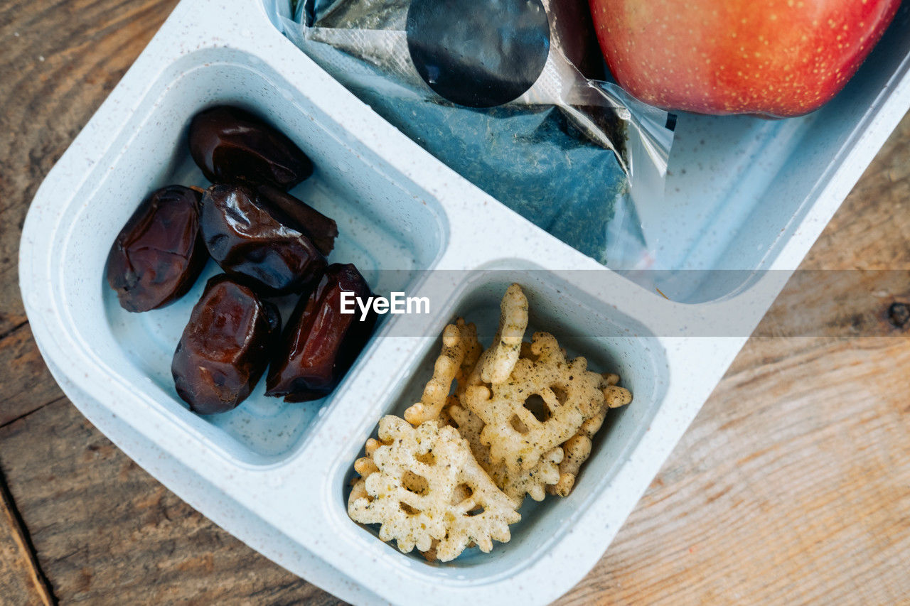 food and drink, food, produce, meal, healthy eating, fruit, freshness, wellbeing, breakfast, wood, high angle view, dish, plant, dessert, no people, table, baked, bowl, indoors, snack, nut, still life, lunch, nut - food