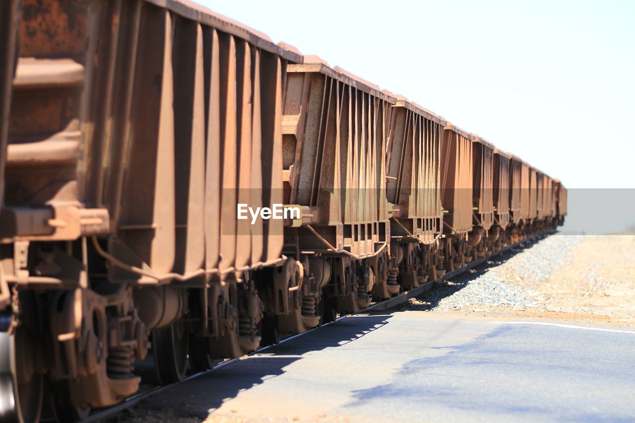 Train on railroad track against sky