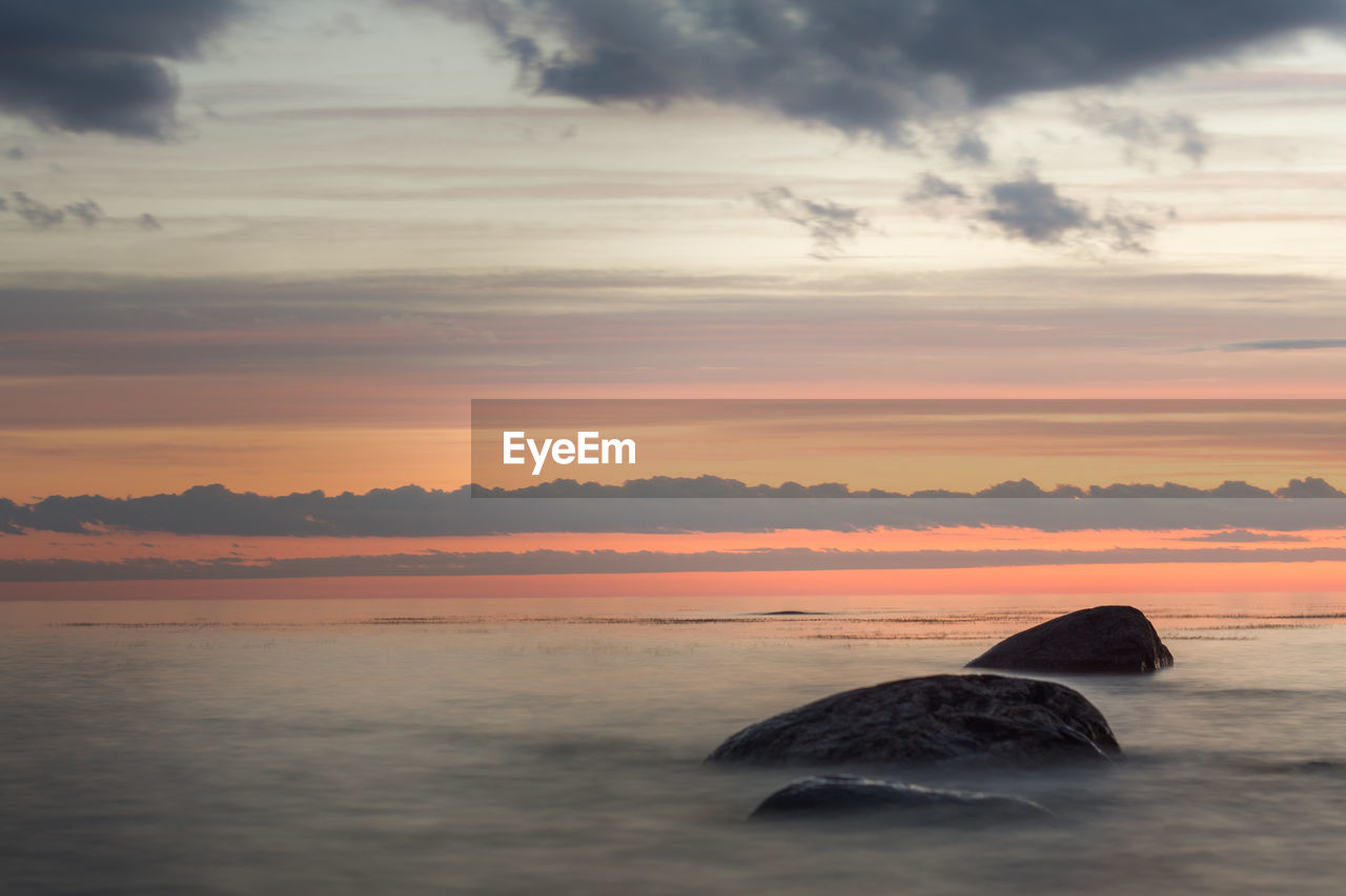 VIEW OF SEA AT SUNSET