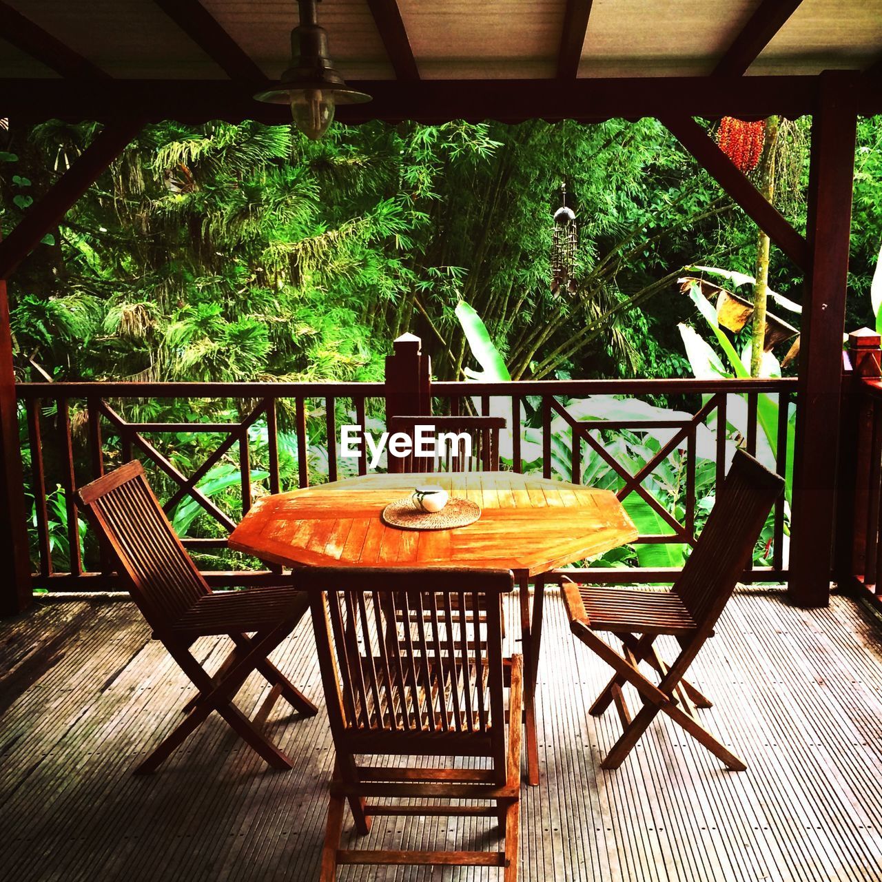 Empty chair with table in tourist resort