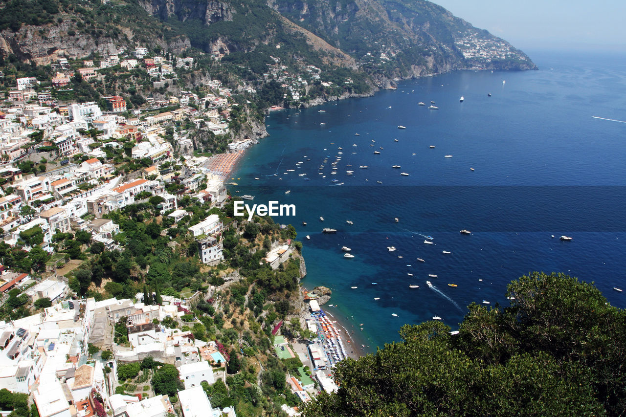 High angle view of town by sea