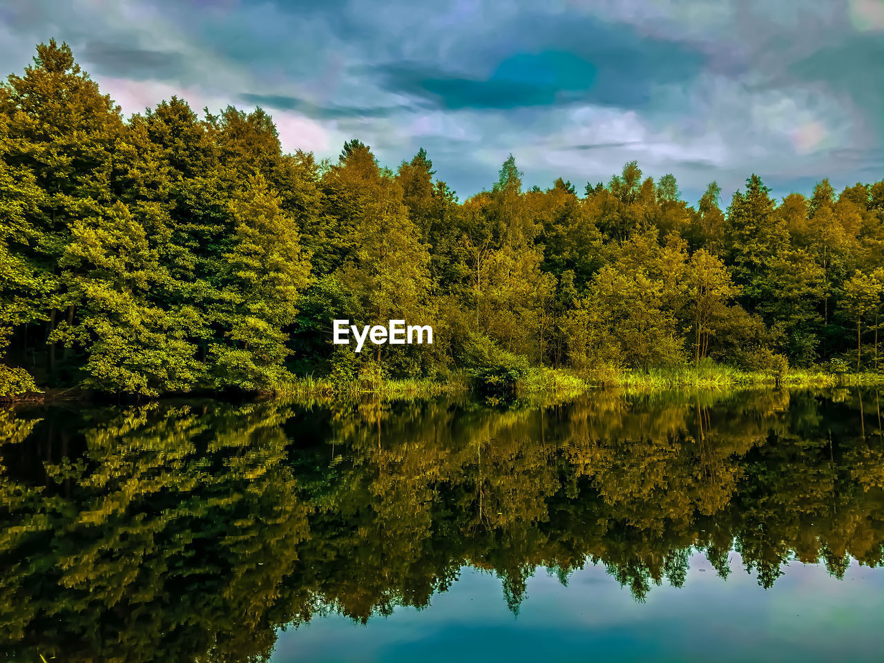 Scenic view of lake against sky during autumn