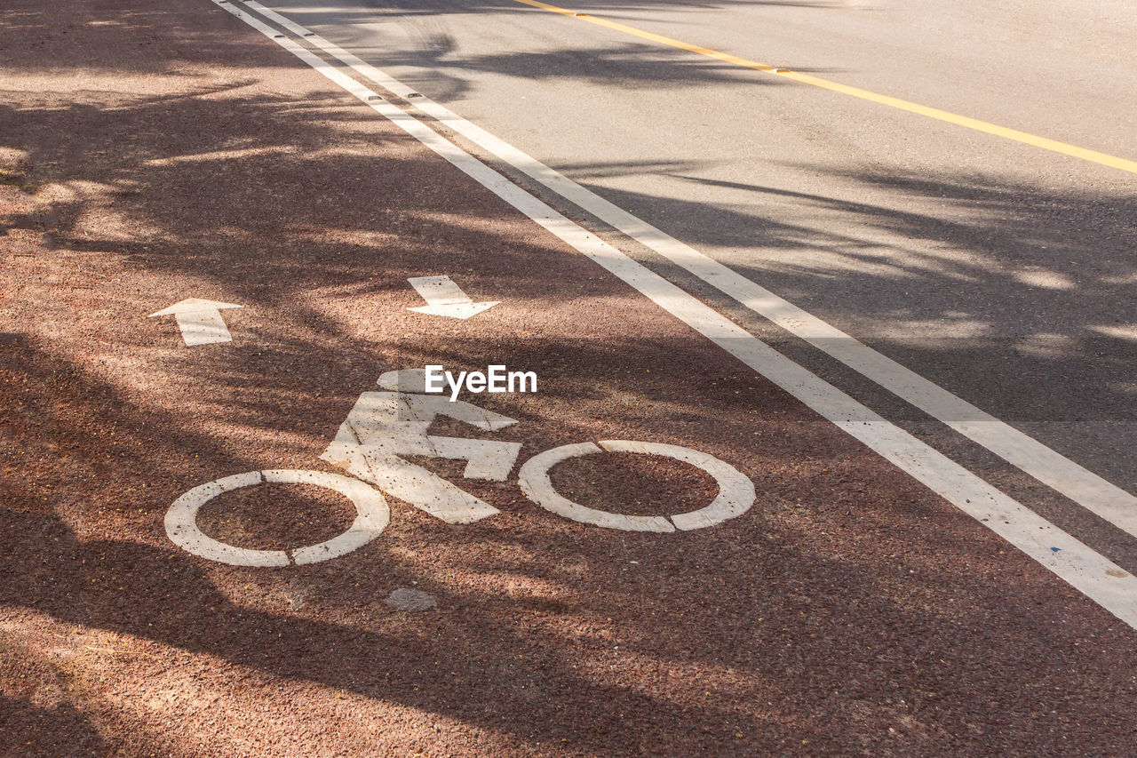 High angle view of bicycle sign on road