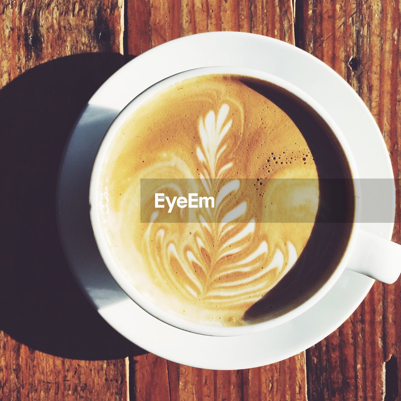 Directly above shot of cappuccino on table