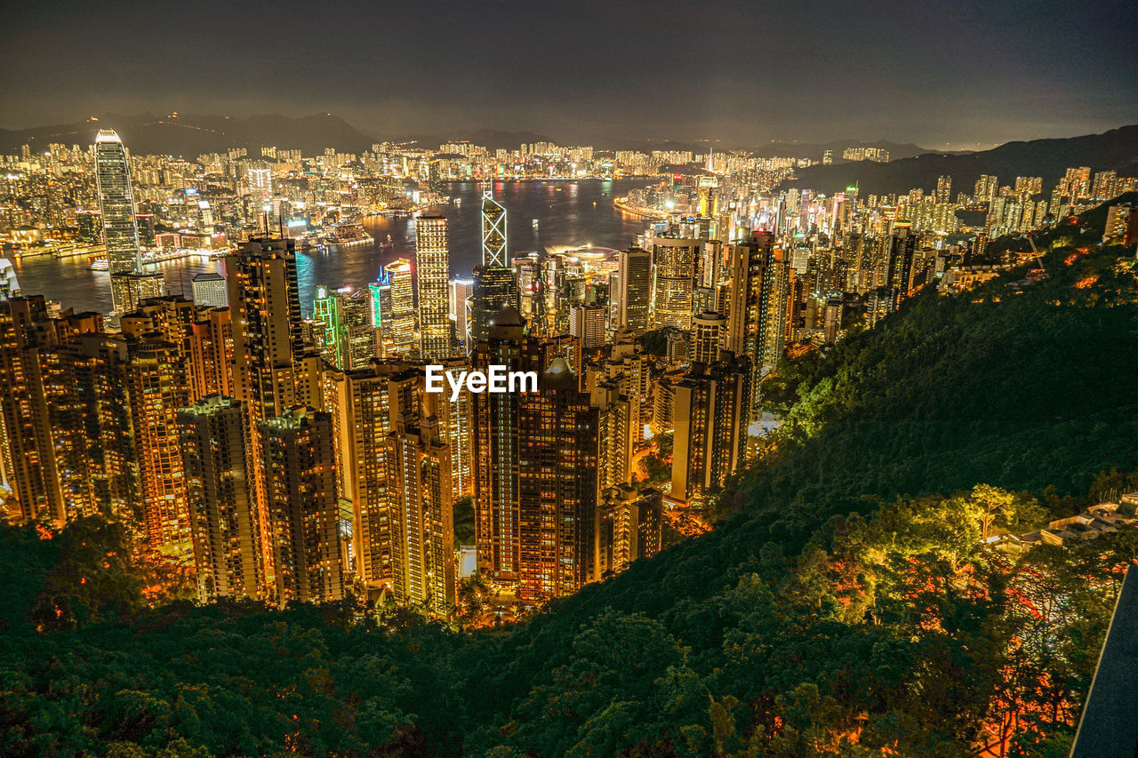 high angle view of illuminated cityscape at night