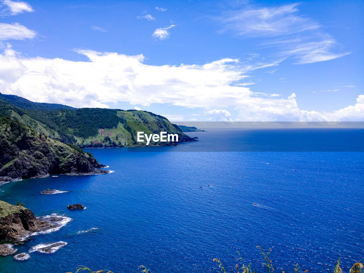 SCENIC VIEW OF BAY AGAINST CLEAR SKY