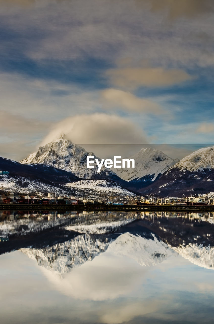 Scenic view of snowcapped mountains against sky