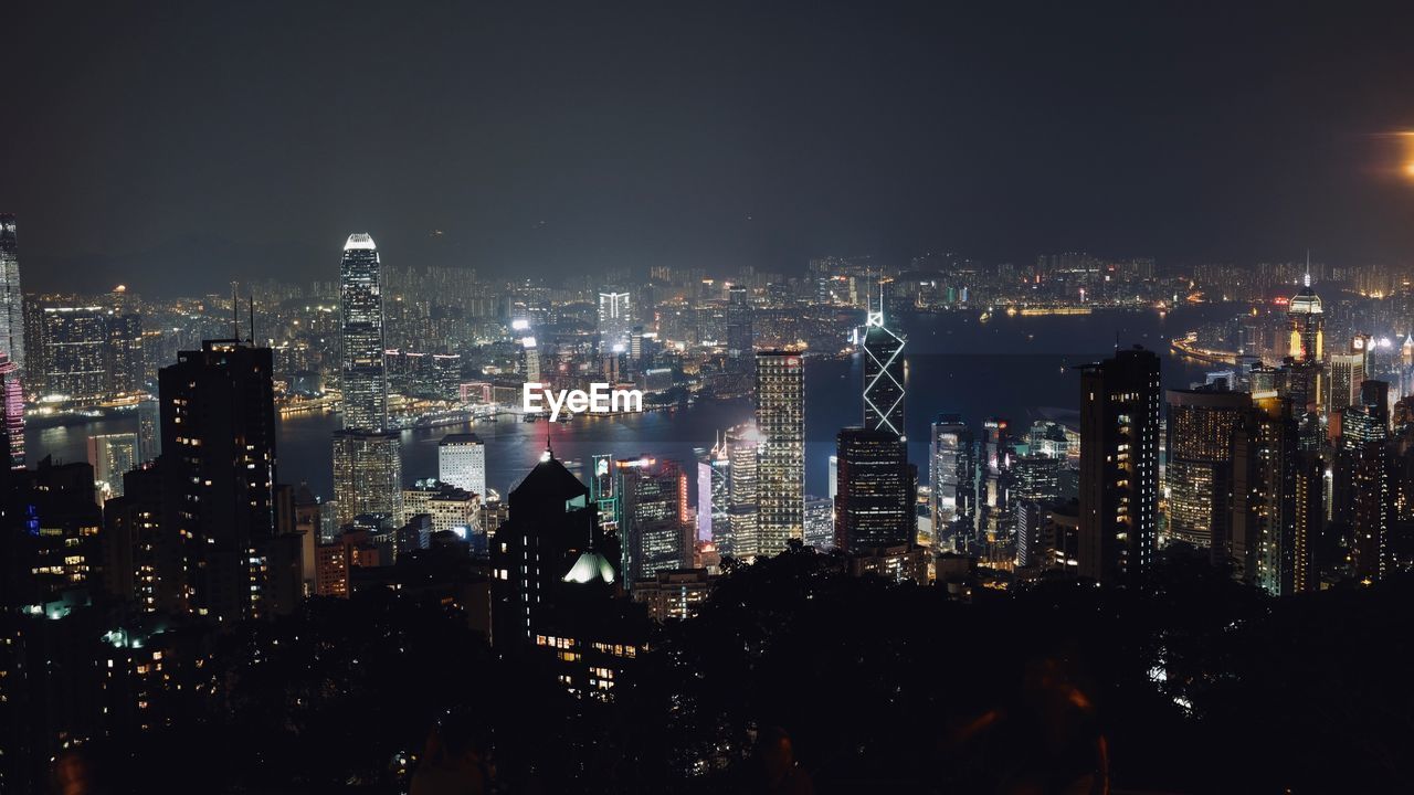 ILLUMINATED CITYSCAPE AT NIGHT