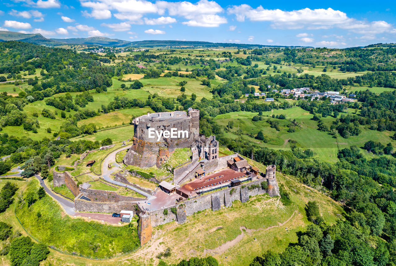 HIGH ANGLE VIEW OF TREES AND BUILDINGS
