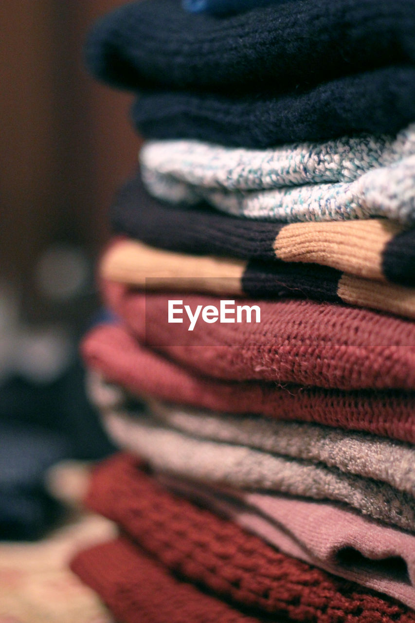 Close-up of folded sweaters