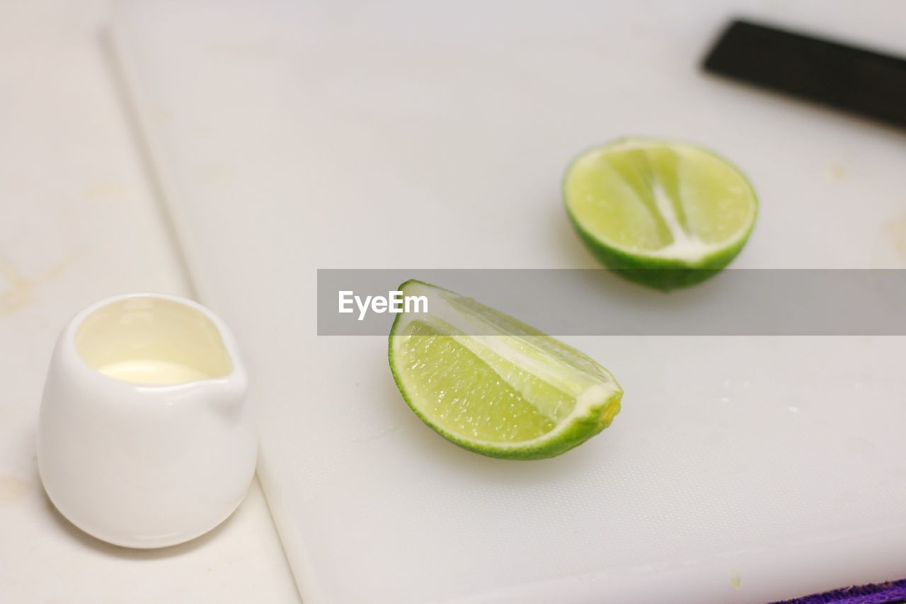 High angle view of green fruits on table