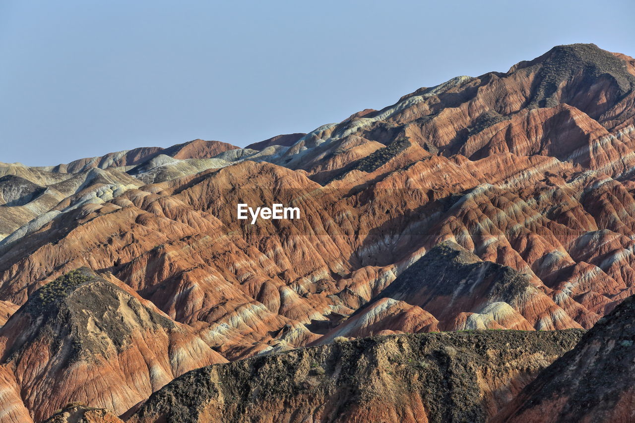 0884 rusty sandstone and siltstone landforms-zhangye danxia nnal.geological park. gansu prov.-china.