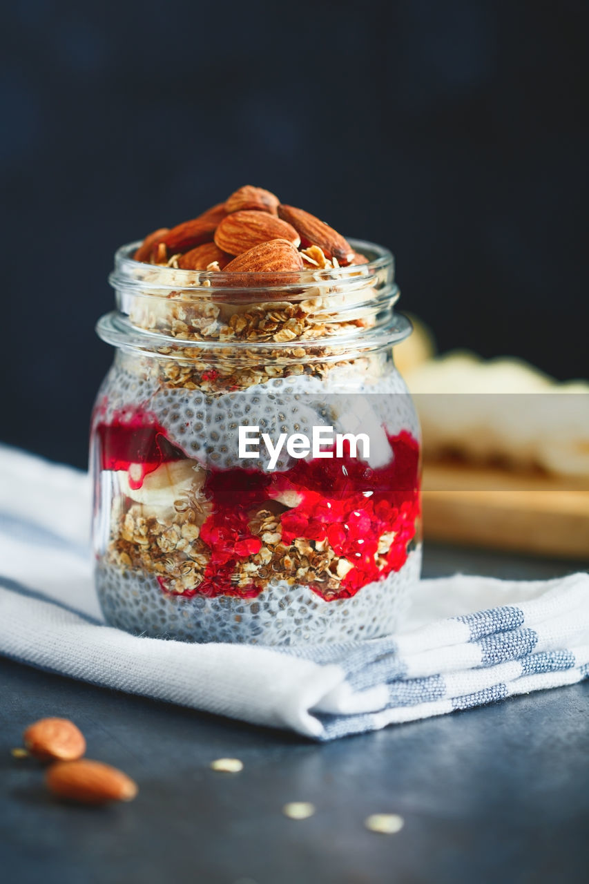 Close-up of dessert in jar on table