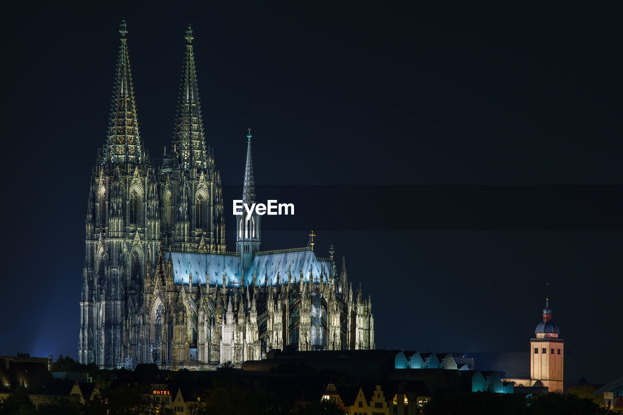 View of cologne cathedral against sky at night