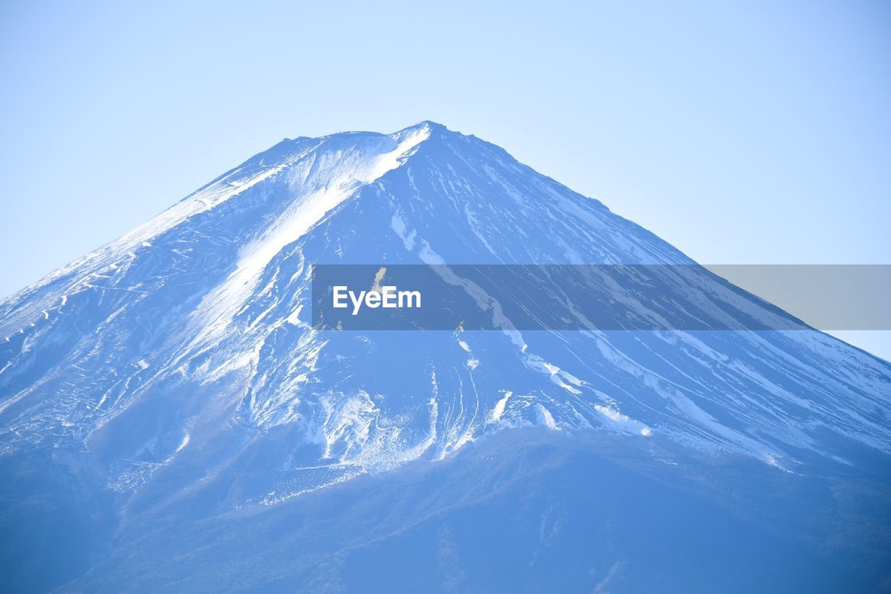 SCENIC VIEW OF SNOWCAPPED MOUNTAIN AGAINST CLEAR BLUE SKY