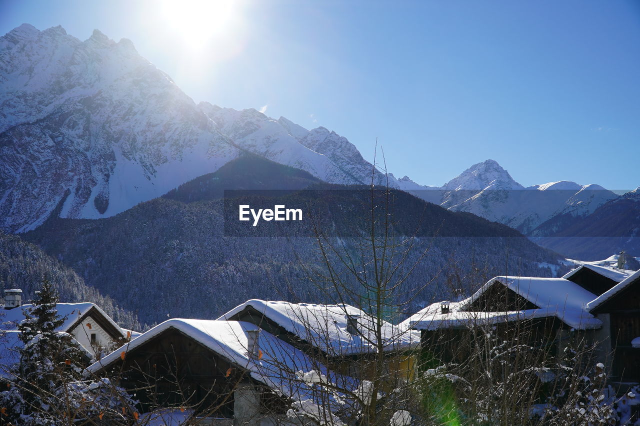 Scenic view of snowcapped mountains against sky