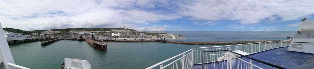 PANORAMIC VIEW OF SEA AND MOUNTAINS AGAINST SKY