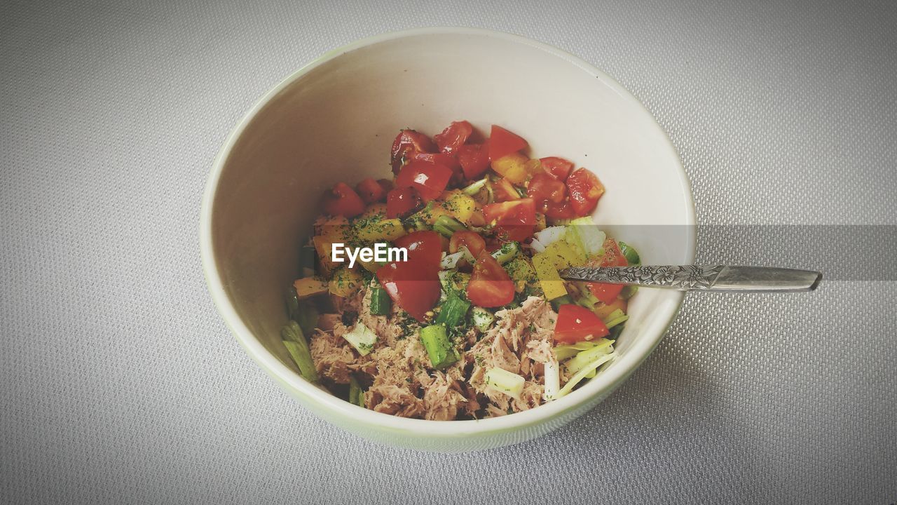 High angle view of salad served in bowl on table